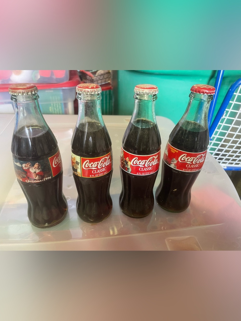 4 Coca Cola Christmas bottles label showing Santa 1996 1997 1998 1999 never open